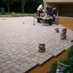 Block paving driveway - laying and compacting