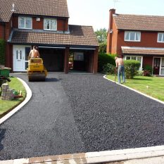 Tarmac driveway roller in action