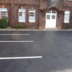 Tarmac driveway with parking lines